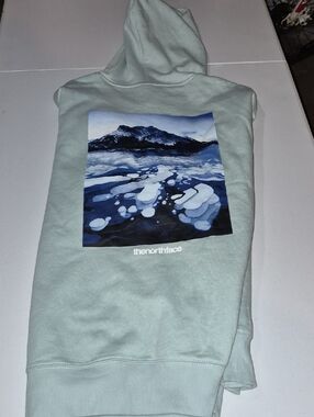 The North Face Men’s Sage Green Crewneck Hoodie with Blue Mountain Graphic